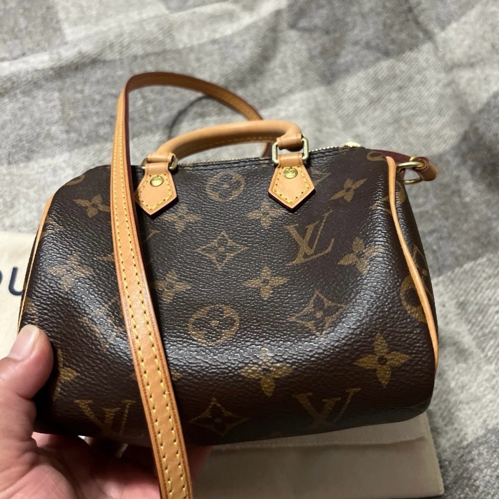 Louis Vuitton Mini Brown Monogram Bag

Speedy Nano! - Picture 10 of 10